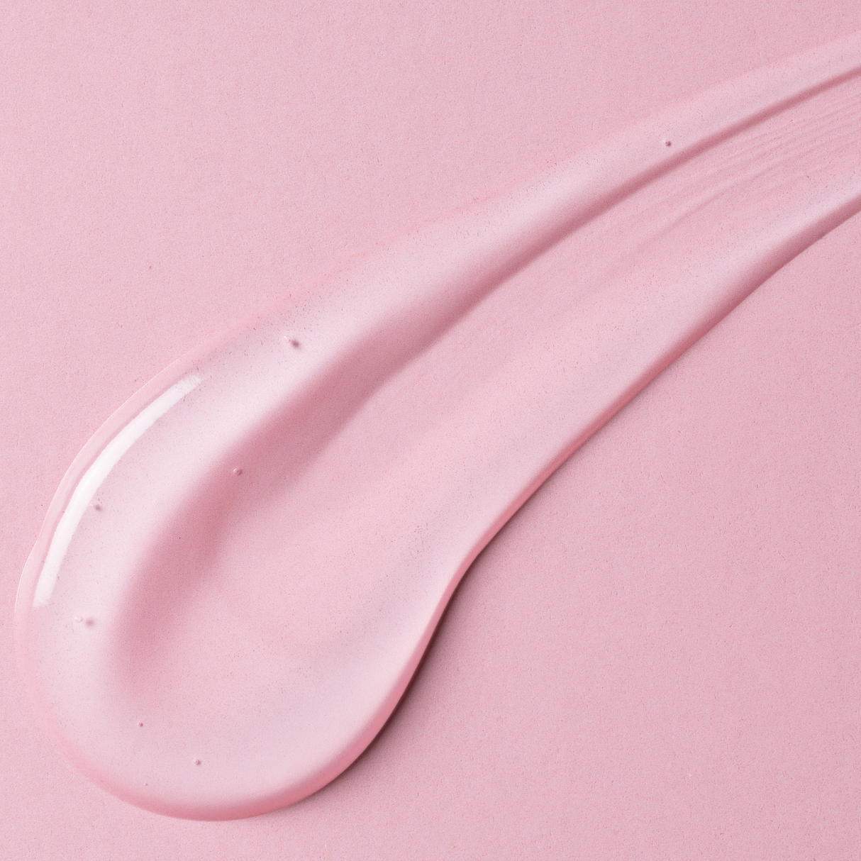 Details of the 2-in-1 shampoo, smooth, moisturising, fragrance free. Close-up smear of Brightpack 2-in-1 Shampoo #30 showing clear liquid texture