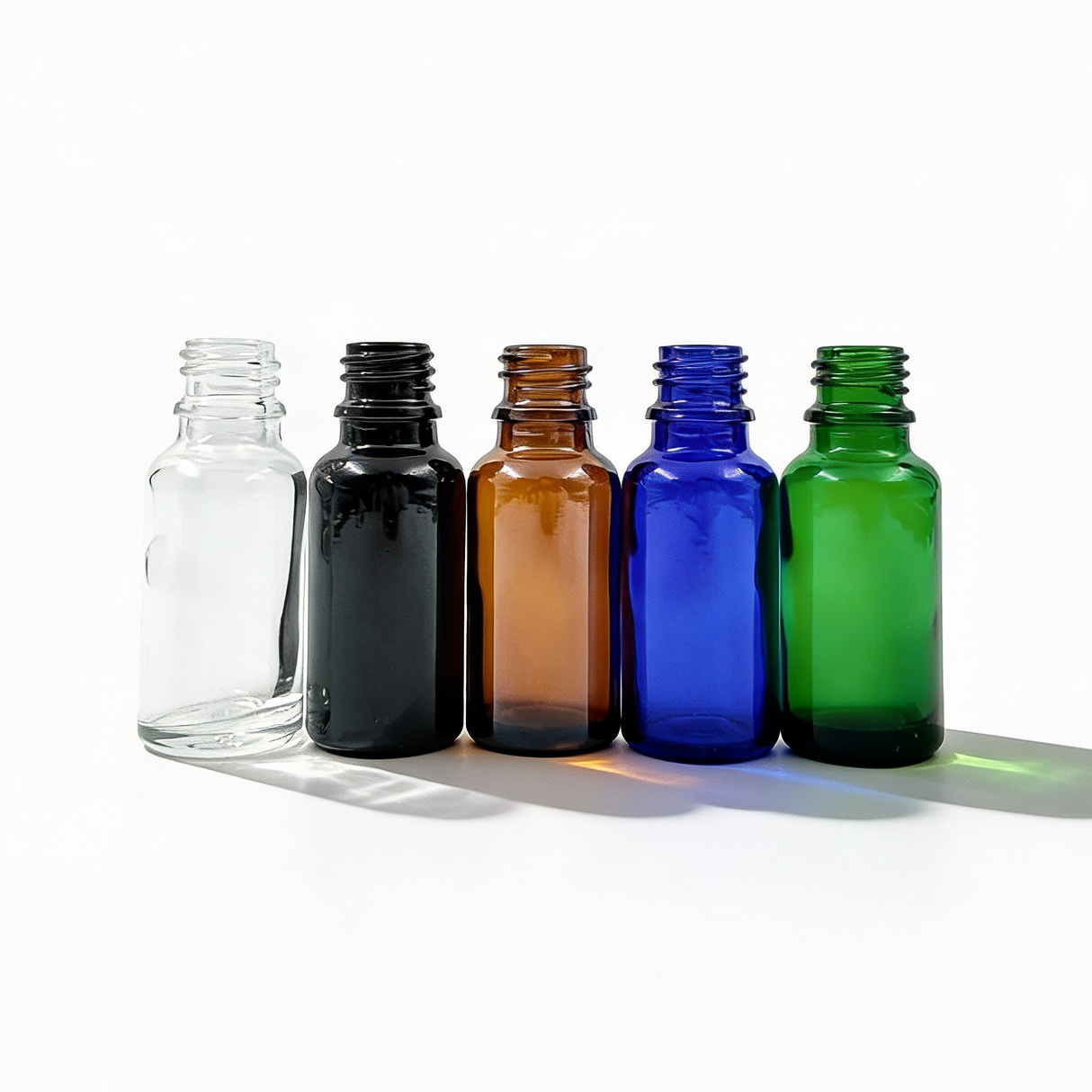 Collection of 20ml glass dropper bottles, empty cosmetic packaging for serums, oils and skincare formulations