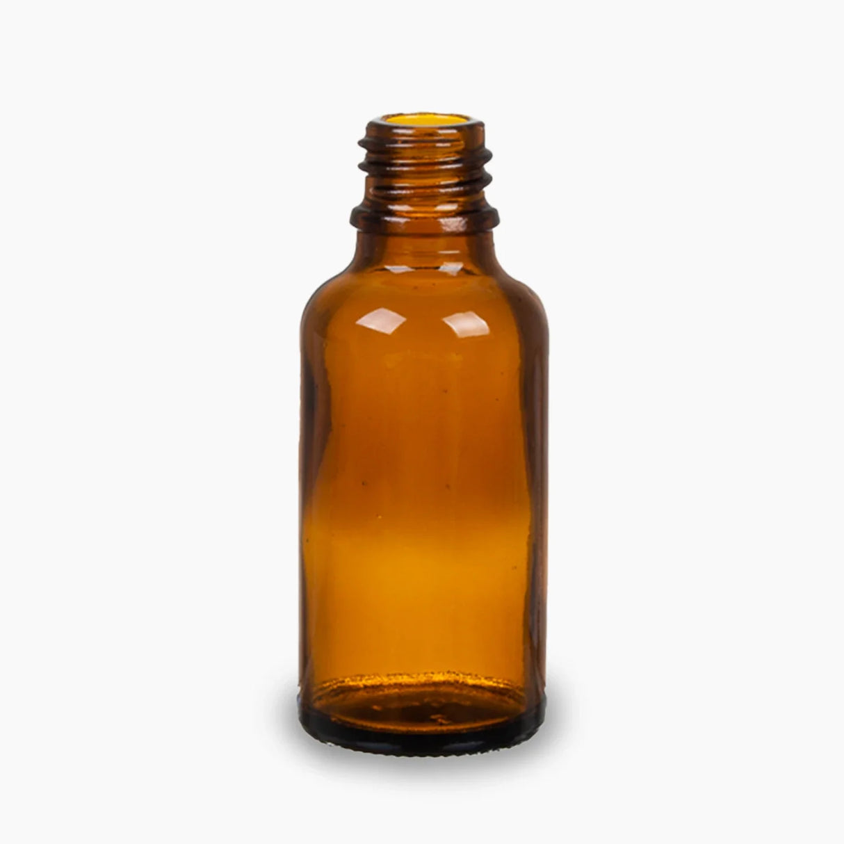 Amber 30ml glass bottle standing upright on white background