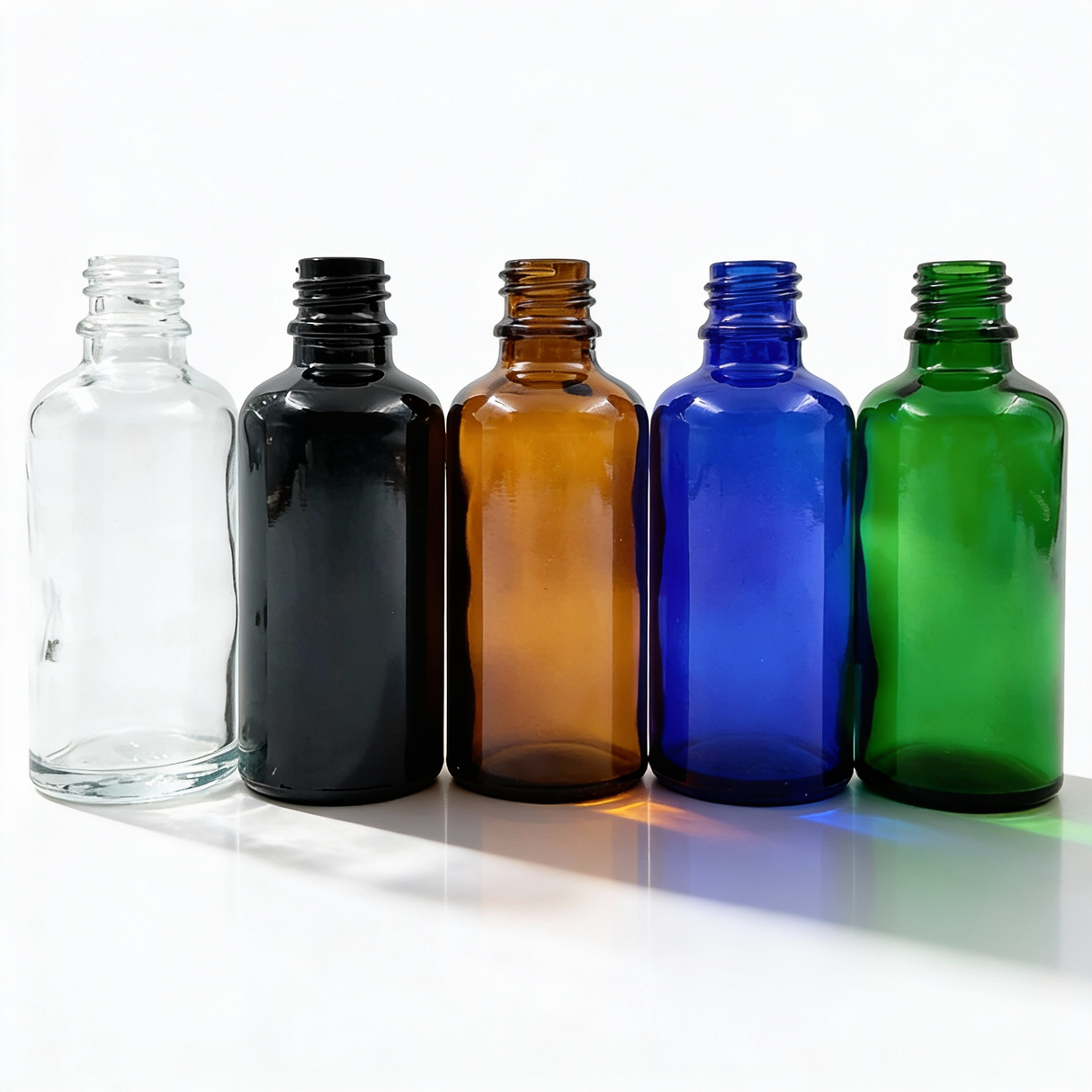 Collection of 50ml glass dropper bottles, empty cosmetic packaging for serums, oils and skincare formulations