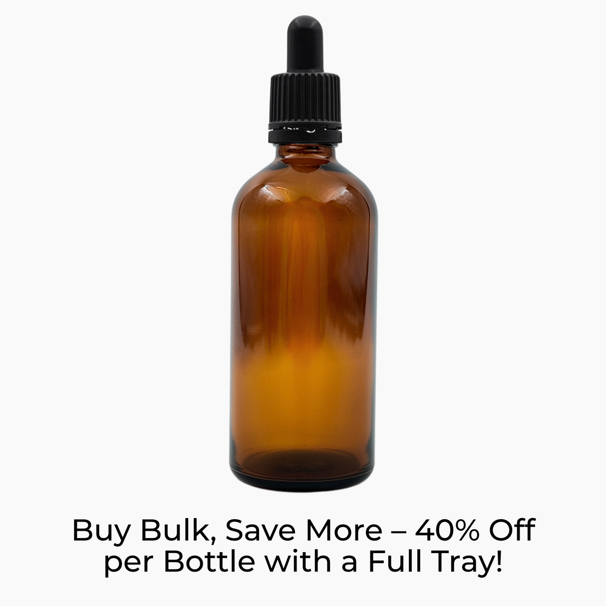 Amber 100ml glass bottle with black pipette dropper on white background