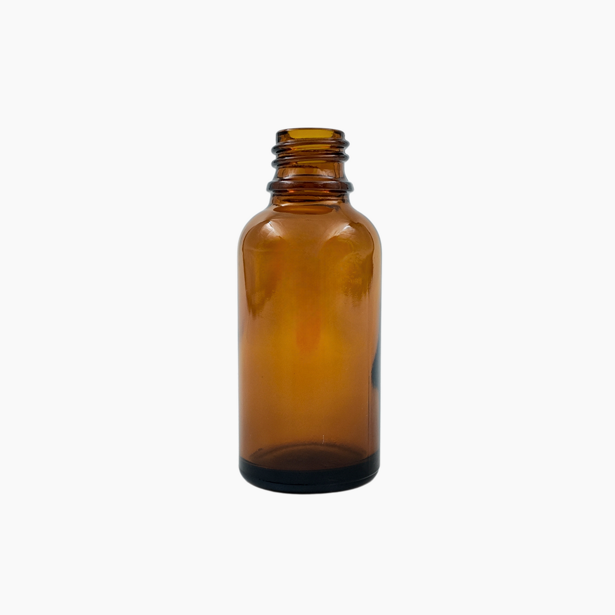 Amber 30ml glass bottle standing upright on white background