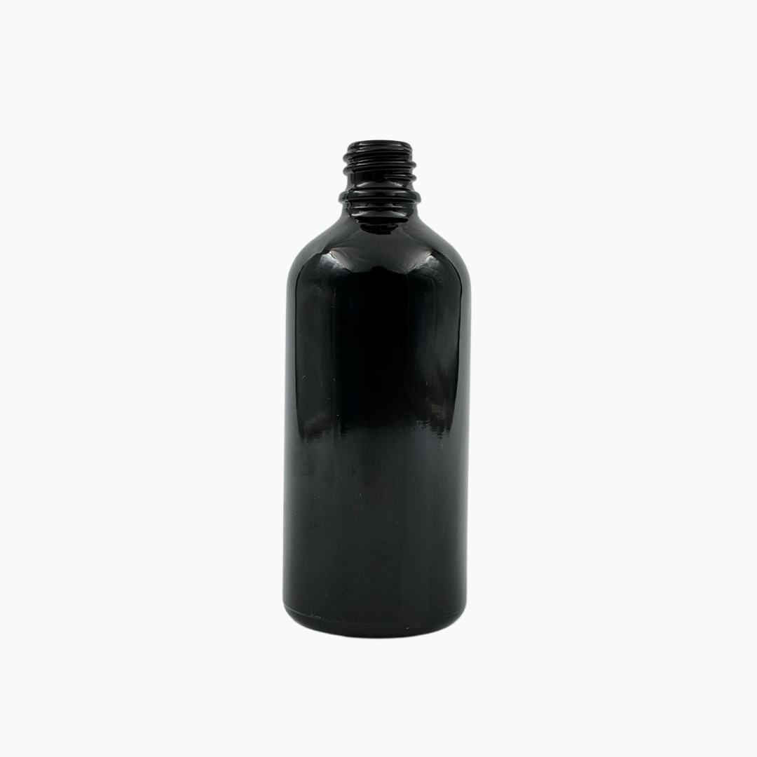 Black 100ml glass bottle standing upright on white background