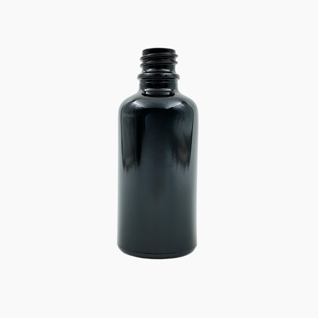Black 50ml glass bottle standing upright on white background