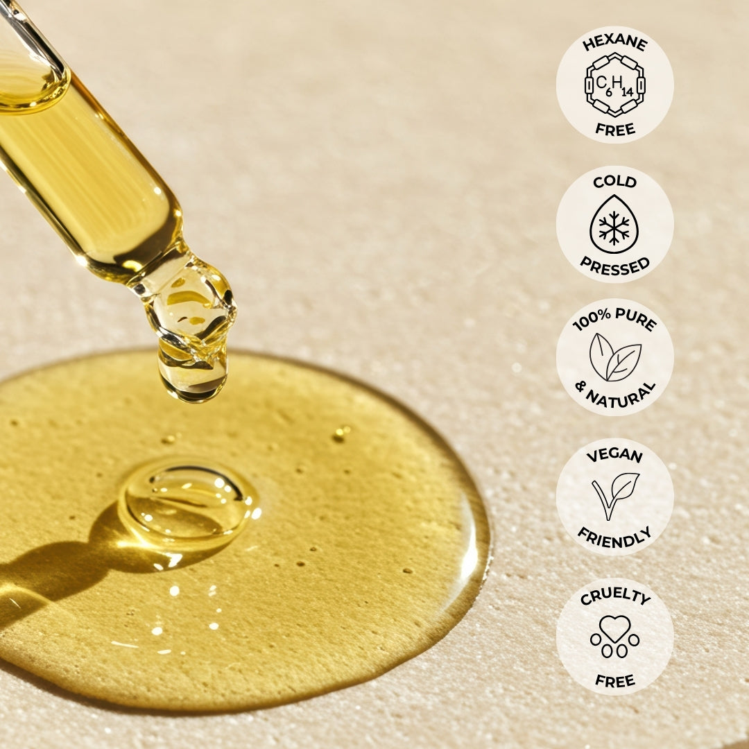 Lifestyle display of castor oil bottle featuring badge claims such as cold-pressed, vegan, and cruelty-free.