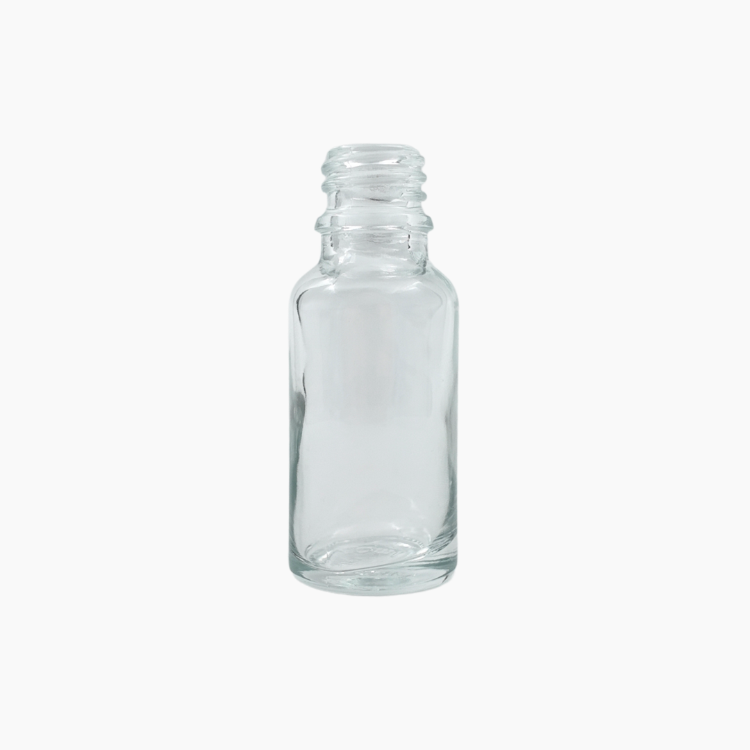 Clear 20ml glass bottle standing upright on white background