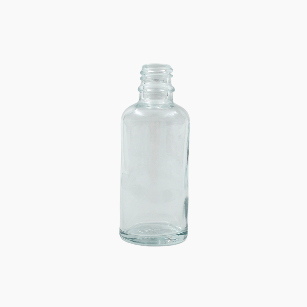 Clear 50ml glass bottle standing upright on white background