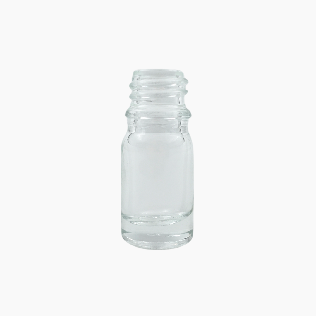 Clear 5ml glass bottle standing upright on white background
