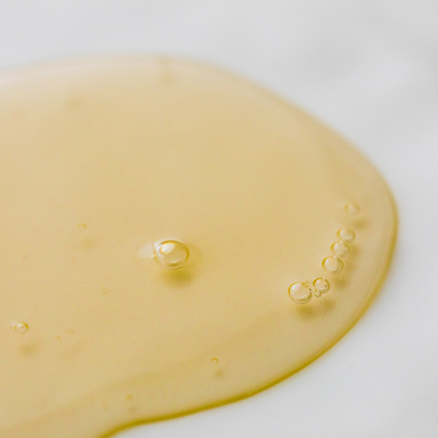 Close-up of a tissue oil droplet on a white background