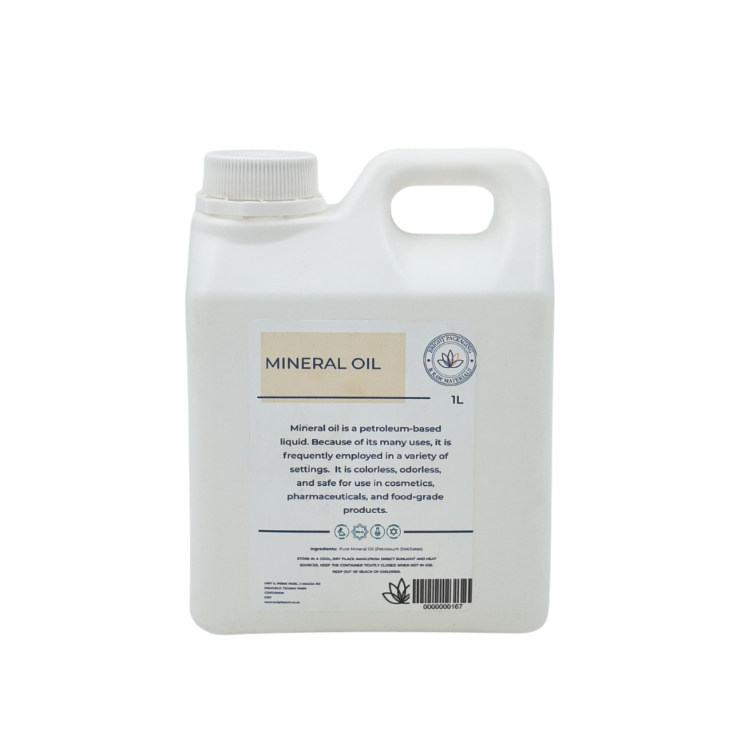 White 1L bottle of mineral oil with a label on a white background