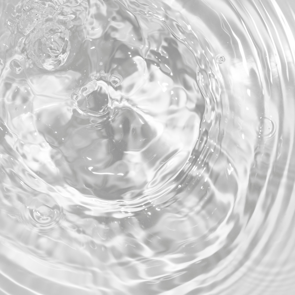 Close-up of Brightpack Diffuser Base #32 liquid showing its clear consistency