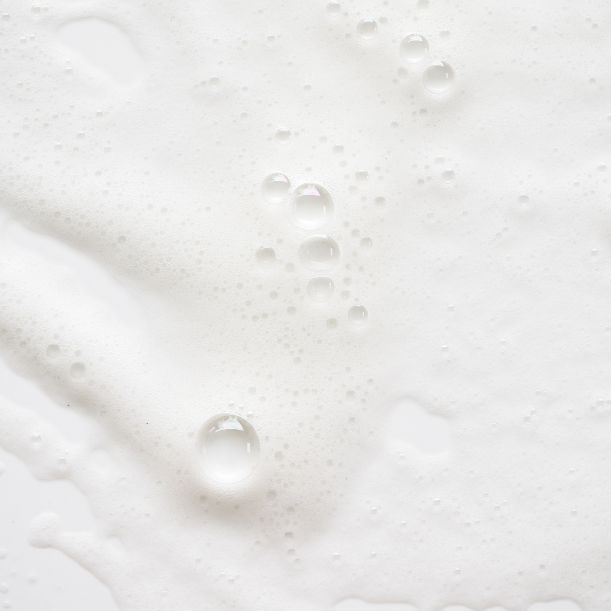 Close-up of Brightpack Ultra Dishwashing Liquid #36 showing foamy soapy liquid texture