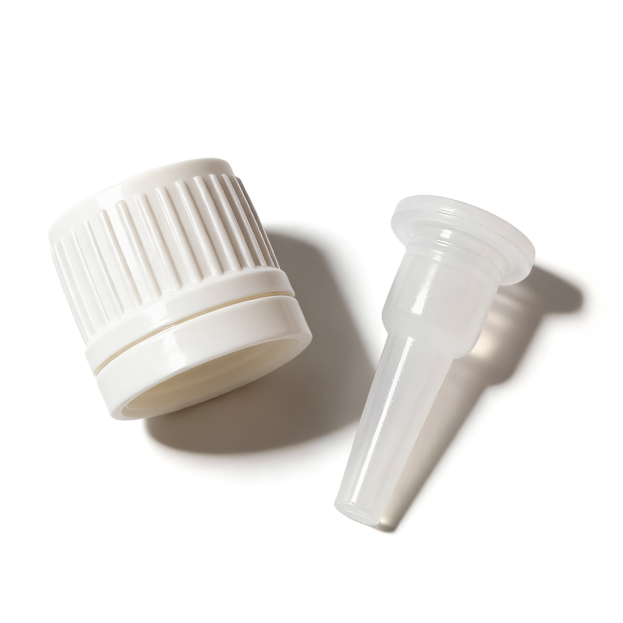 White dropper cap with tamper evident seal and 0.7 mm medium flow orifice for cosmetic, pharmaceutical and liquid product bottles