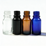 Collection of 10ml glass dropper bottles, empty cosmetic packaging for serums, oils and skincare formulations