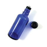 Black 18 mm roller ball with cap on blue glass bottle ideal for perfumes, essential oils and liquid skincare applications