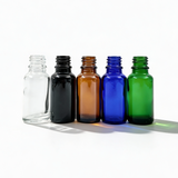 Collection of 20ml glass dropper bottles, empty cosmetic packaging for serums, oils and skincare formulations