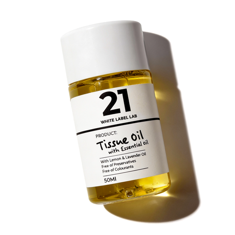 50 ml bottle of Brightpack tissue oil infused with essential oils for skin nourishment.