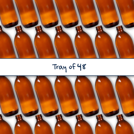 Collection of amber 500ml glass bottles, empty cosmetic packaging for serums, oils and skincare formulations