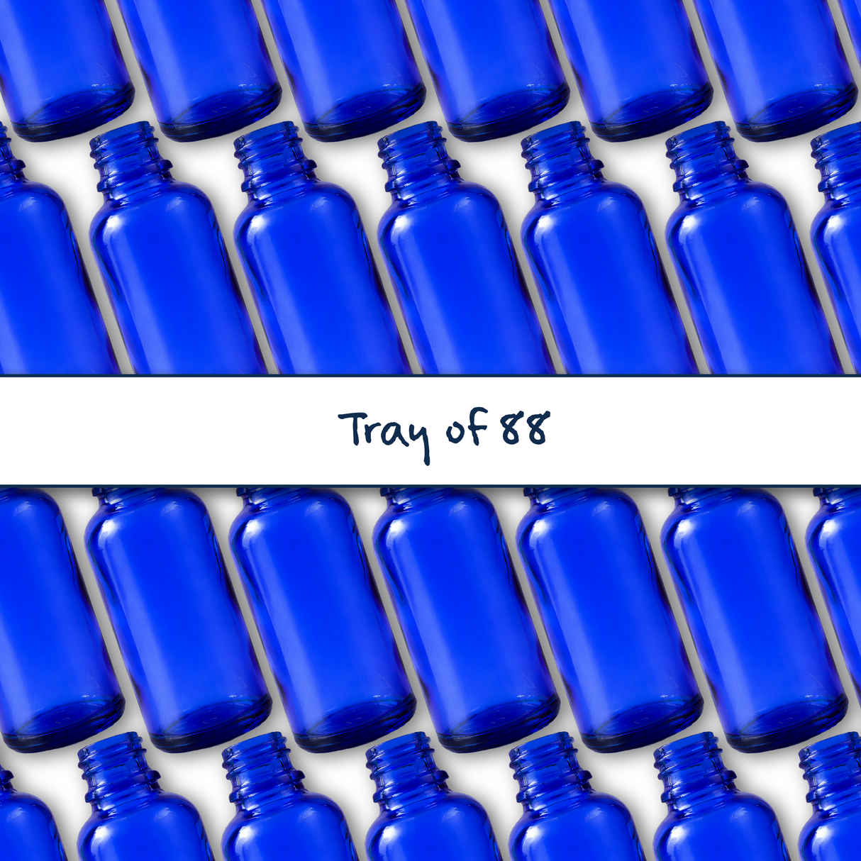 Collection of blue 50ml glass dropper bottles, empty cosmetic packaging for serums, oils and skincare formulations