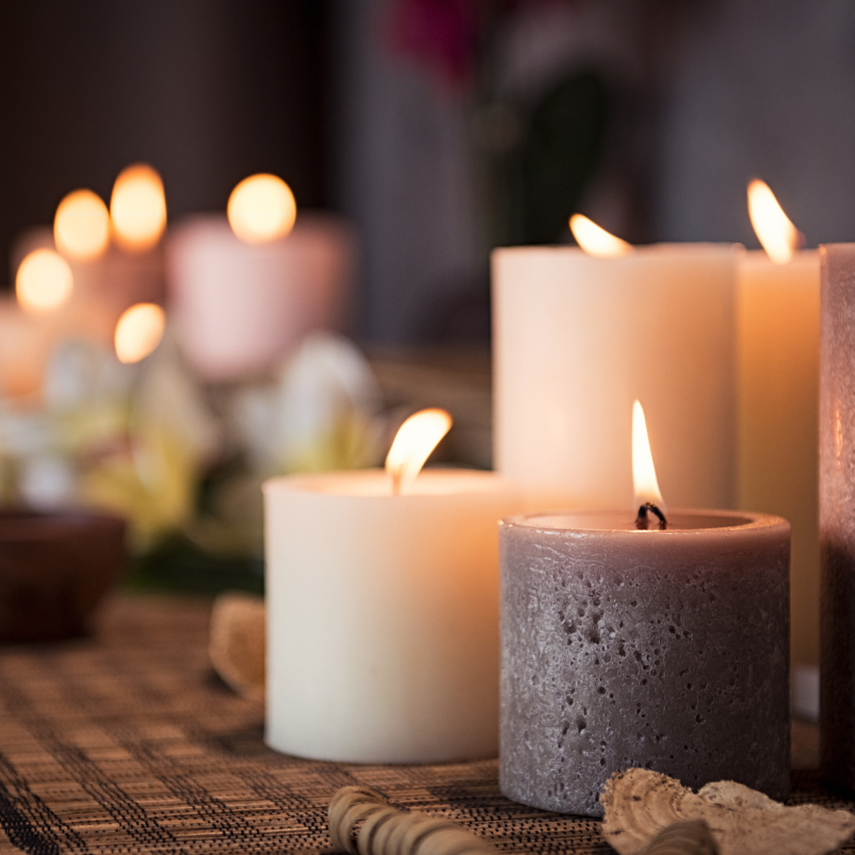 Candles on a table with a blurred background