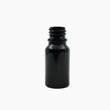 Black 20ml glass bottle standing upright on white background