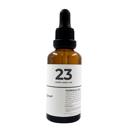 Amber glass bottle with dropper labeled '23 White Label Lab - Hydrate Serum' on a white background