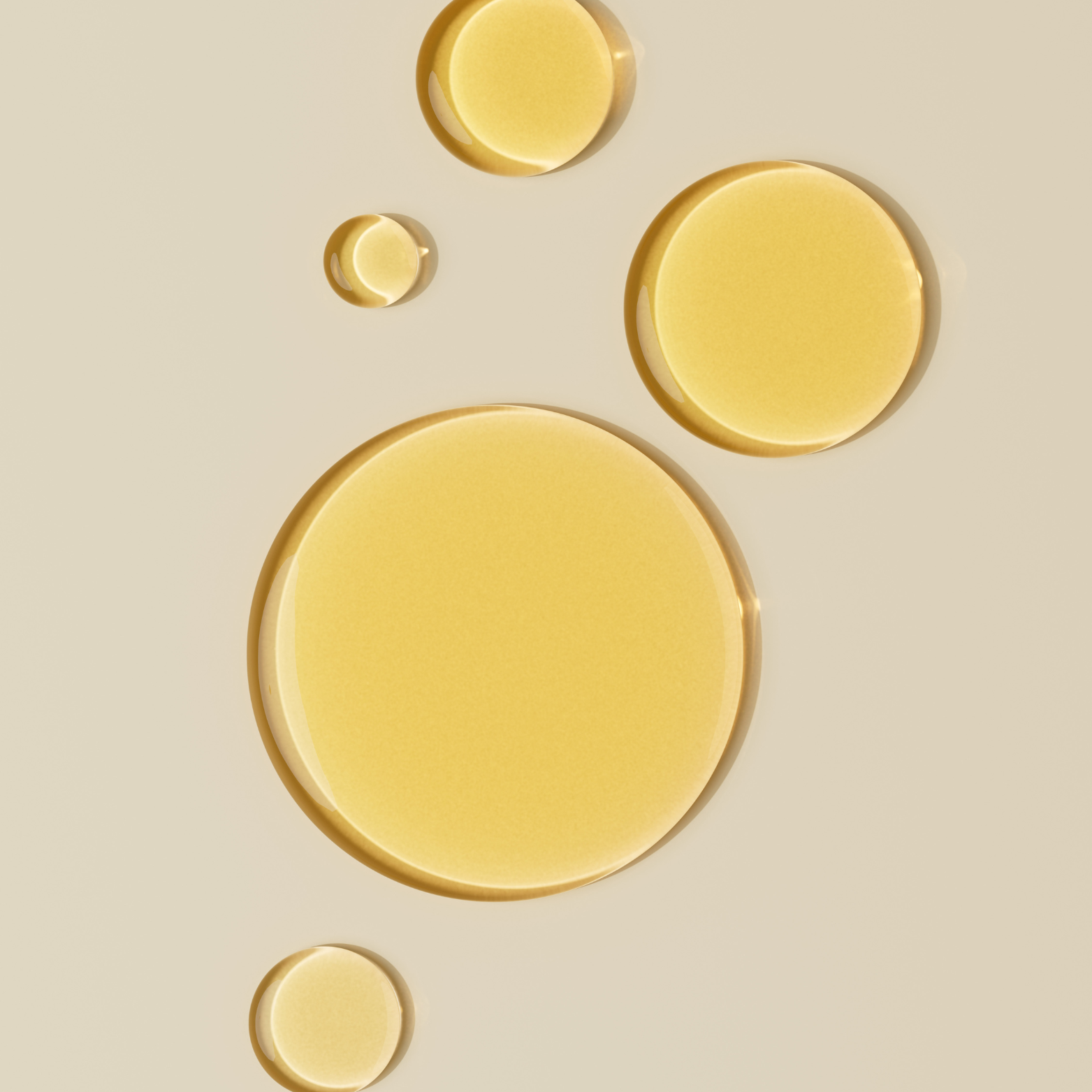 A close-up of Brightpack Tissue Oil, showcasing its smooth, lightweight texture that penetrates deeply into the skin, offering intense hydration, reducing scars, and improving skin elasticity.Close-up of Brightpack Tissue Oil #21 yellow drops highlighting liquid texture and colour