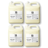 Four large containers of 'Golden Turmeric' laundry lotion with label number 13 on a white background.