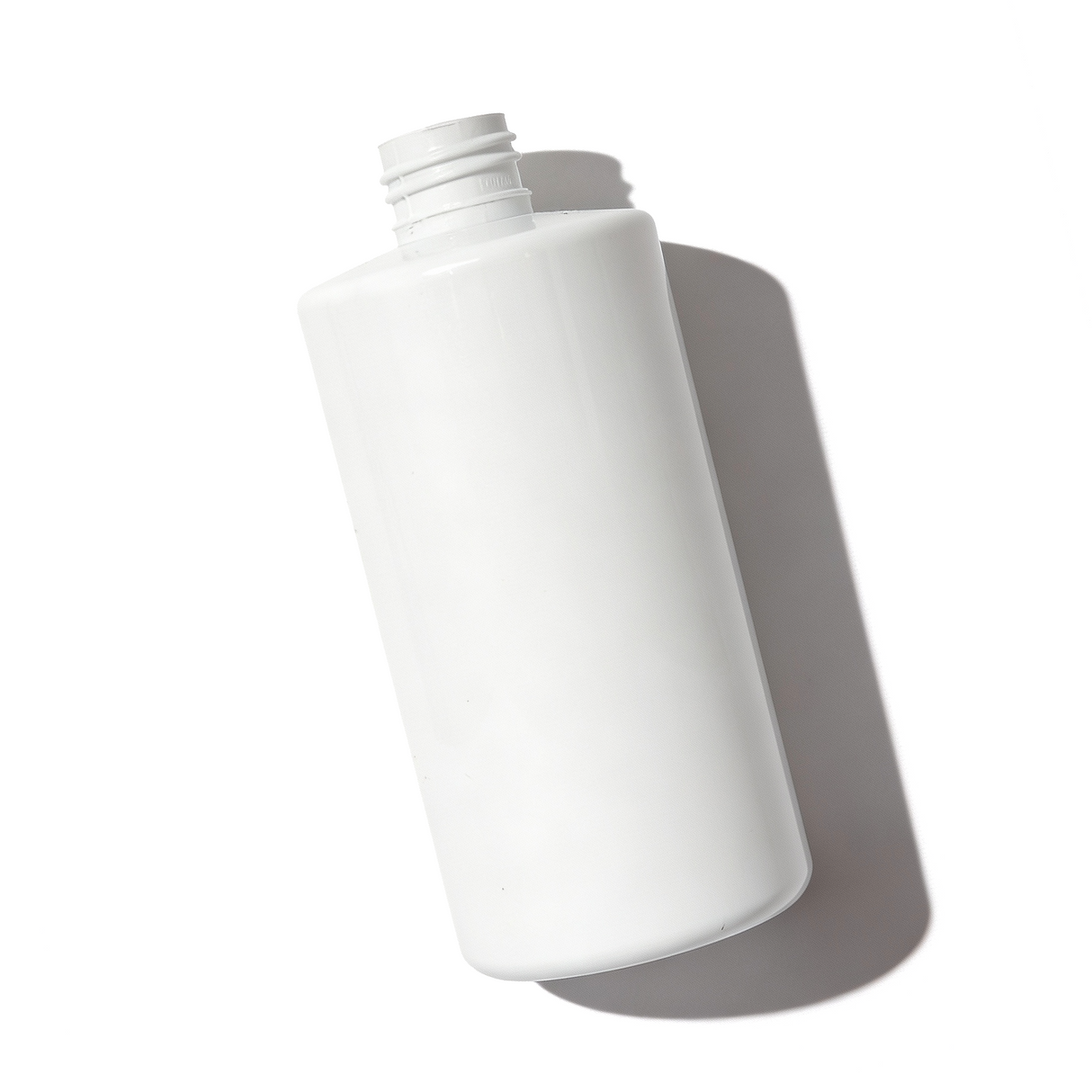 Solid White PET plastic Sharp Cylindrical bottle on a white background