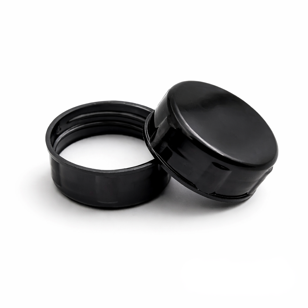 Black 38 mm tablet container cap with EPE liner for pharmaceutical, supplement and pill packaging