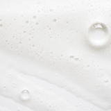 A detailed close-up showcasing the smooth, clear handwash formula with a gentle lather.Close-up of Brightpack Handwash #38 showing silky soapy liquid texture with bubbles