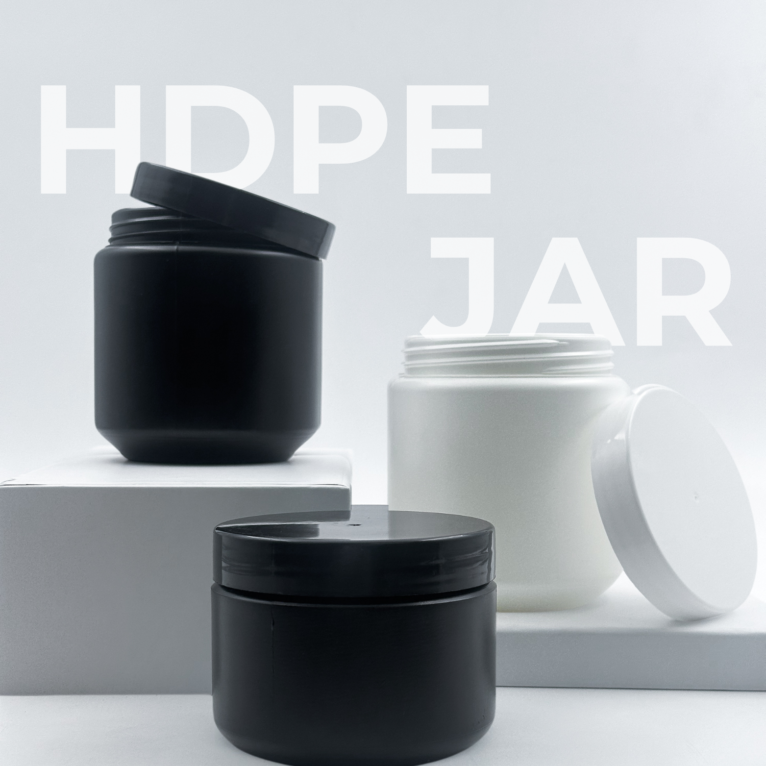 HDPE Jars with closures and in black and white.