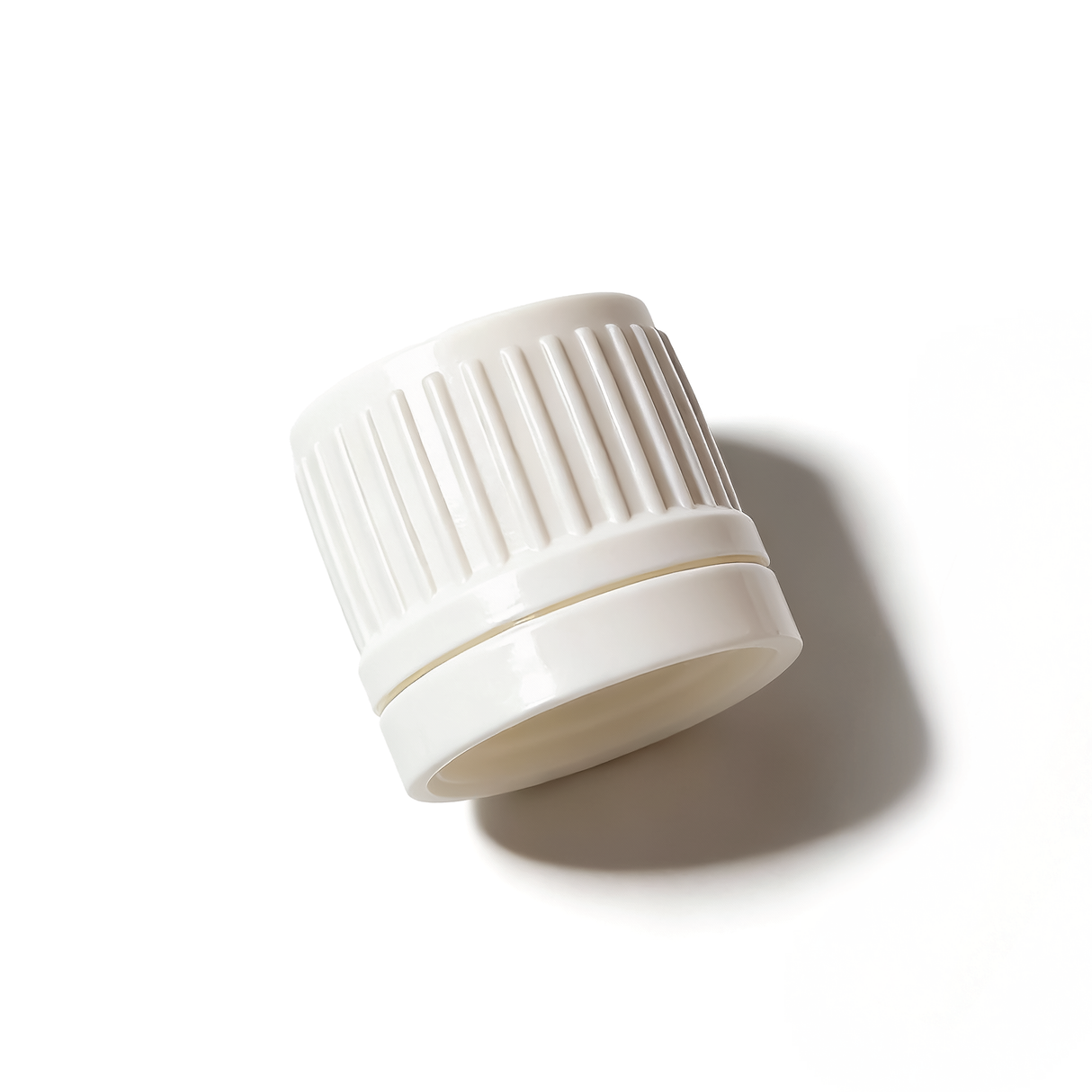 White dropper cap with tamper evident seal and 0.7 mm medium flow orifice for cosmetic, pharmaceutical and liquid product bottles