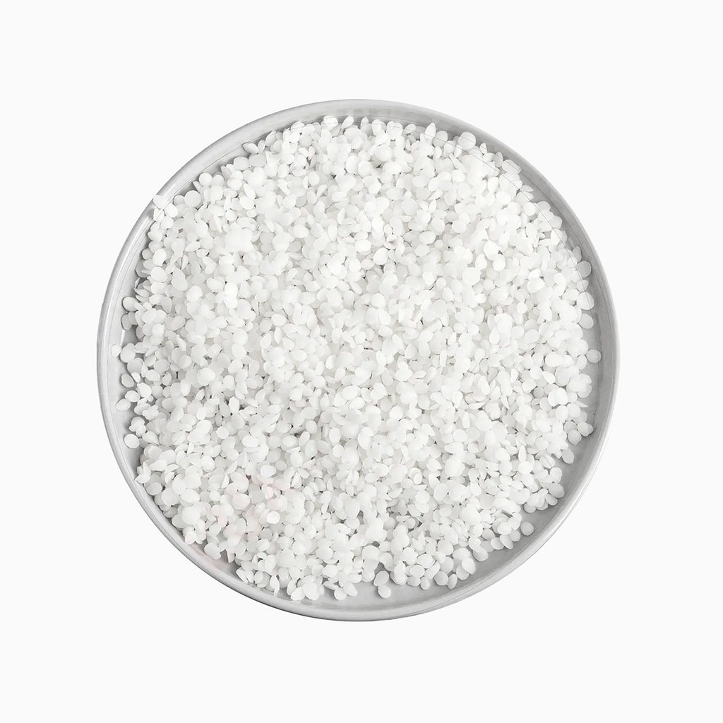 Top View Of Bowl Of Ceto Stearyl Cetearyl Alcohol On White Background | Chemicals Emulsifiers Solubilizers | Brightpack Raw Materials