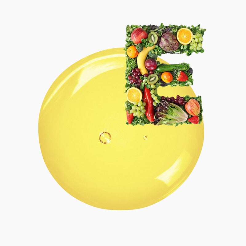Letter E Made Out Of Vegetables Atop A Circular Blob Of Yellow Oil | Bulk Oils | Brightpack Raw Materials