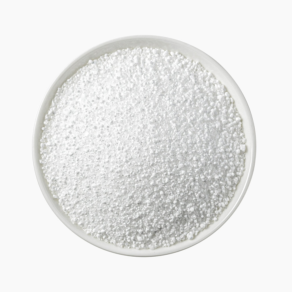 Top View Of Stearic Acid Powder In A Bowl On White Background | Chemicals Emulsifiers Solubilizers | Brightpack Raw Materials